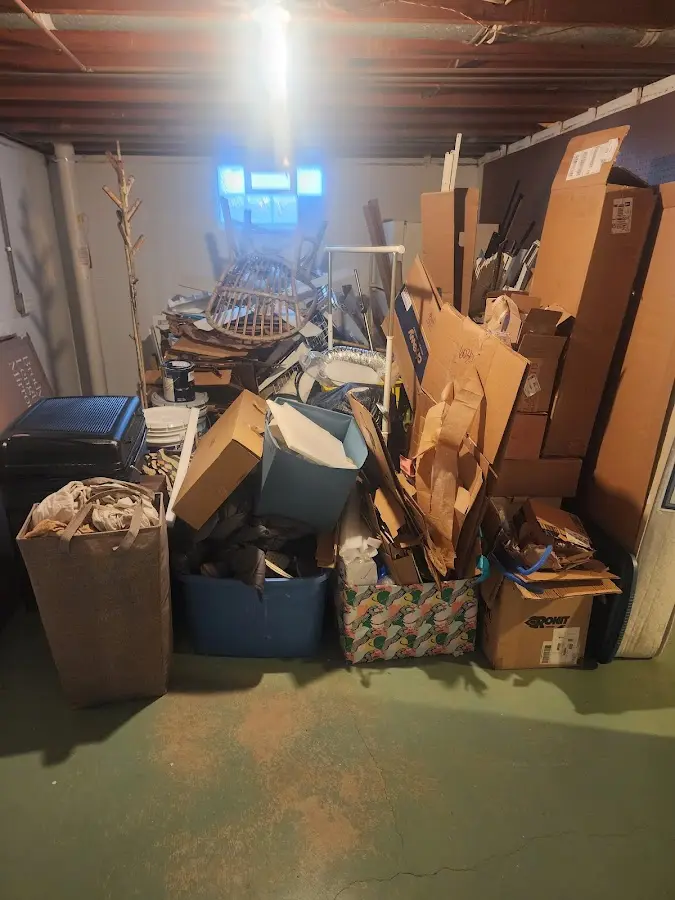 Roll-off dumpster container at job site for 2 Yard Dumpster Rental in Stuart